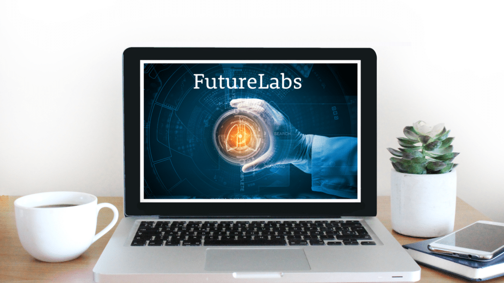 Een afbeelding met een laptop waar op staat: FutureLabs